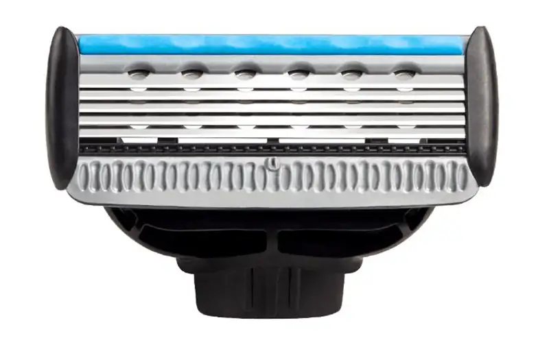 Close-up of a cartridge razor head showing the blades and lubrication strip